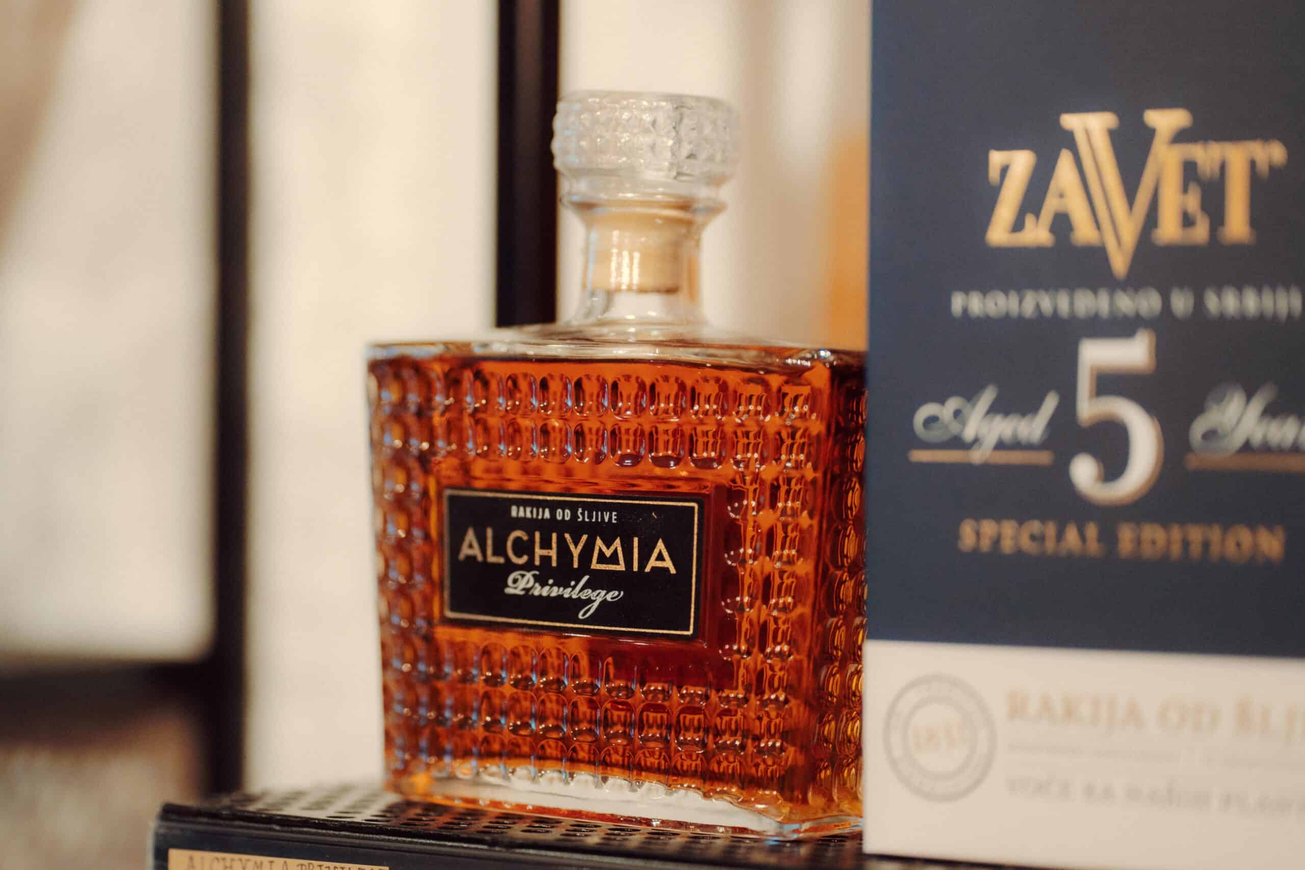 Alchyma Rakija luxury fruit brandy bottle with textured glass and classic label, Slovenian traditional spirit.