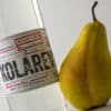 High-quality NDV Rakija with a fresh pear, traditional fruit brandy from Kruske, authentic Slovenian drink.
