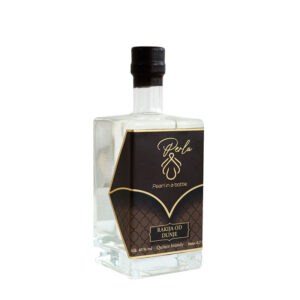 Elegant bottle of NDV Rakija with black and gold label, traditional Serbian fruit brandy.
