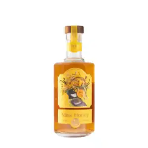 Glass bottle of Miss Honey Rakija with honey and citrus flavor, vibrant yellow label, wooden cap.
