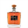 Elegant glass bottle of high-quality Serbian plum rakija, NDV brand.