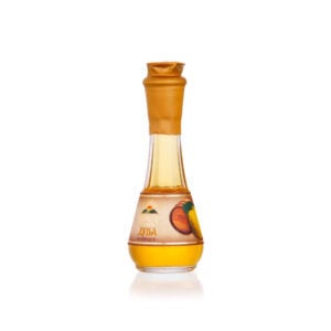 Flavorful fruit rakija in a decorative glass bottle with traditional label. Perfect for authentic Balkan spirits.