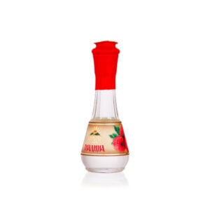 Rakija fruit brandy with raspberry flavor in glass bottle.
