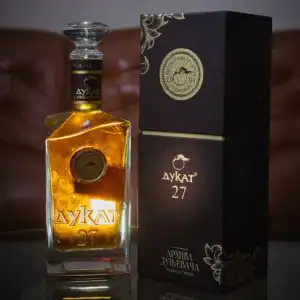 High-quality NDV Rakija 27 from Serbia, premium fruit brandy in elegant packaging.