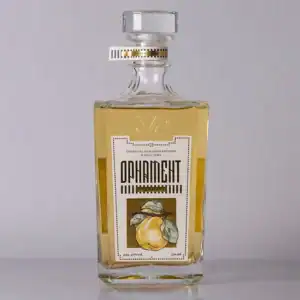 Premium Serbian fruit brandy in a stylish glass bottle.