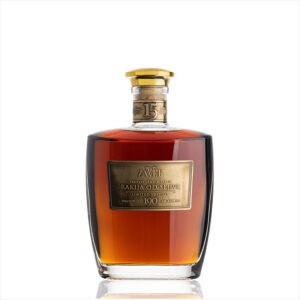 Elegant glass bottle of NDV Rakija with gold cap, showcasing traditional craftsmanship.